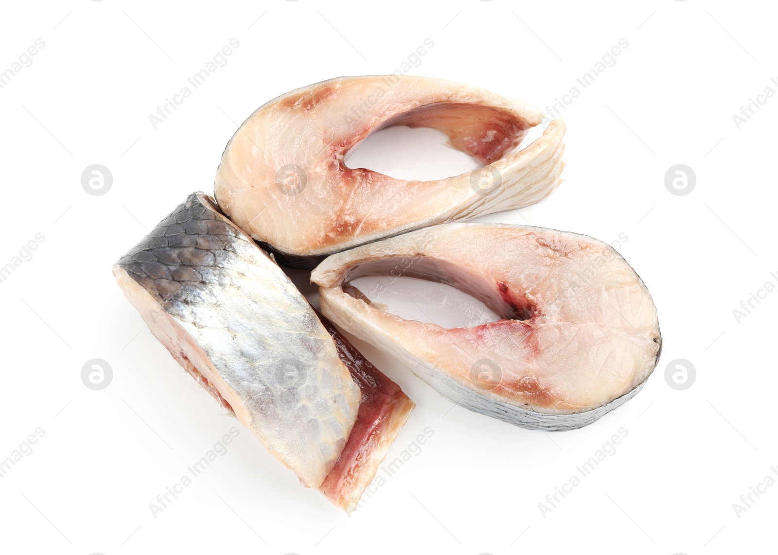 Pieces of delicious herring isolated on white, top view Photo of Pieces of delicious herring isolated on white, top view