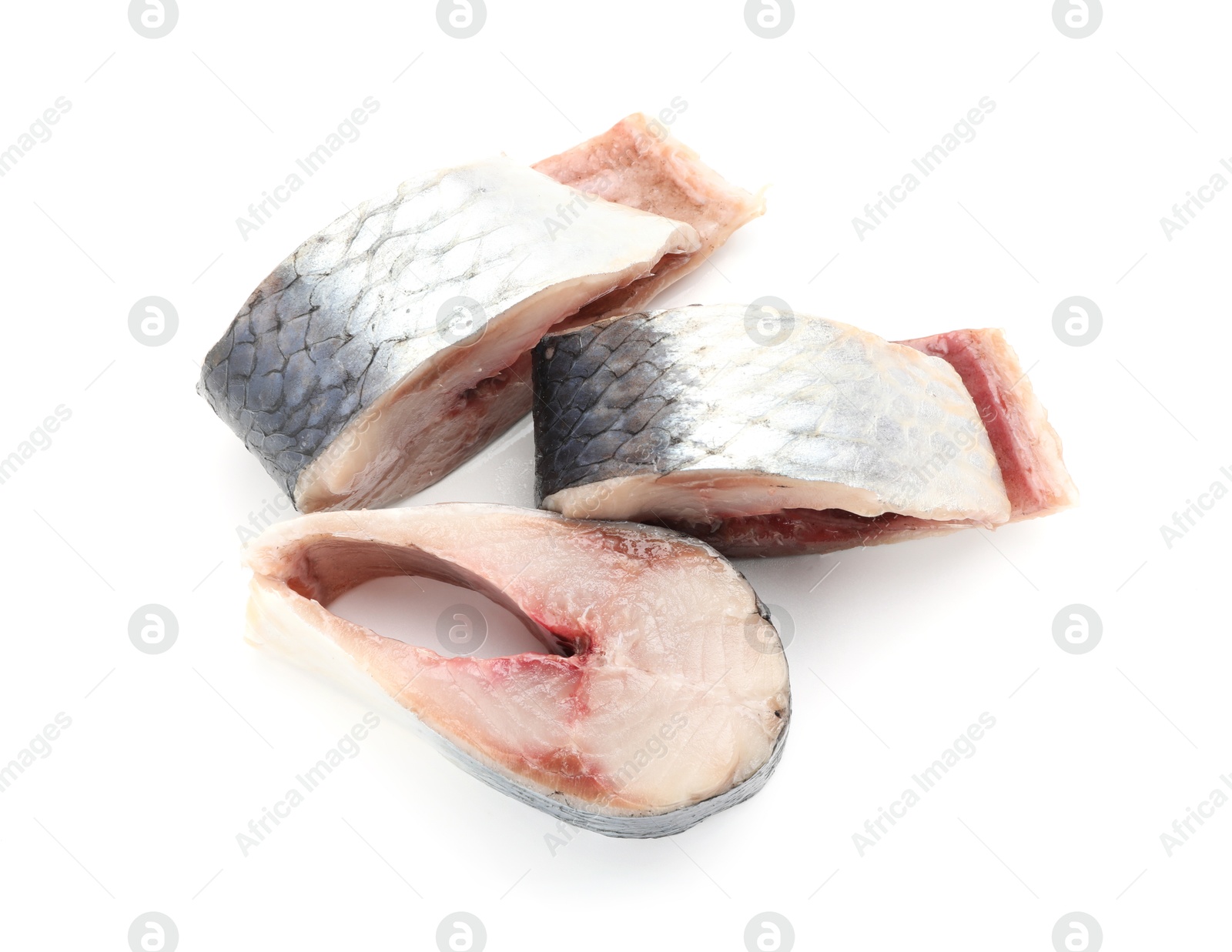 Pieces of delicious herring isolated on white, top view Photo of Pieces of delicious herring isolated on white, top view