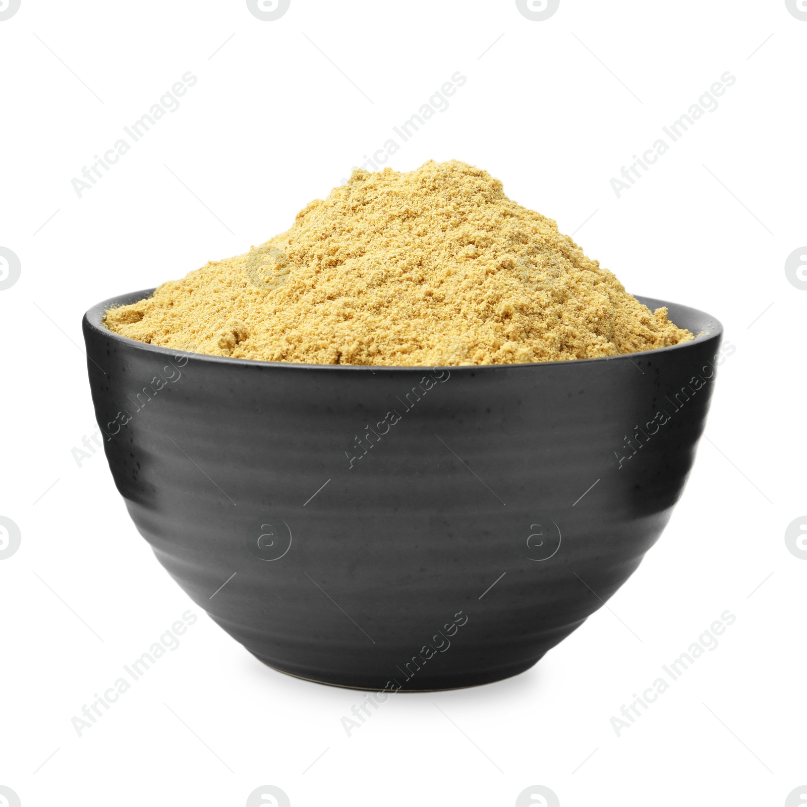 Superfood. Mustard powder in bowl isolated on white Photo of Superfood. Mustard powder in bowl isolated on white