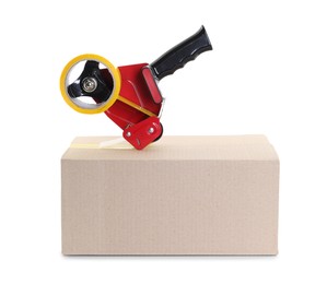 Photo of Dispenser with adhesive tape on cardboard box against white background