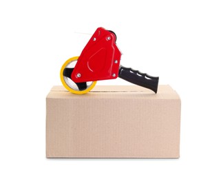 Photo of Dispenser with adhesive tape on cardboard box against white background