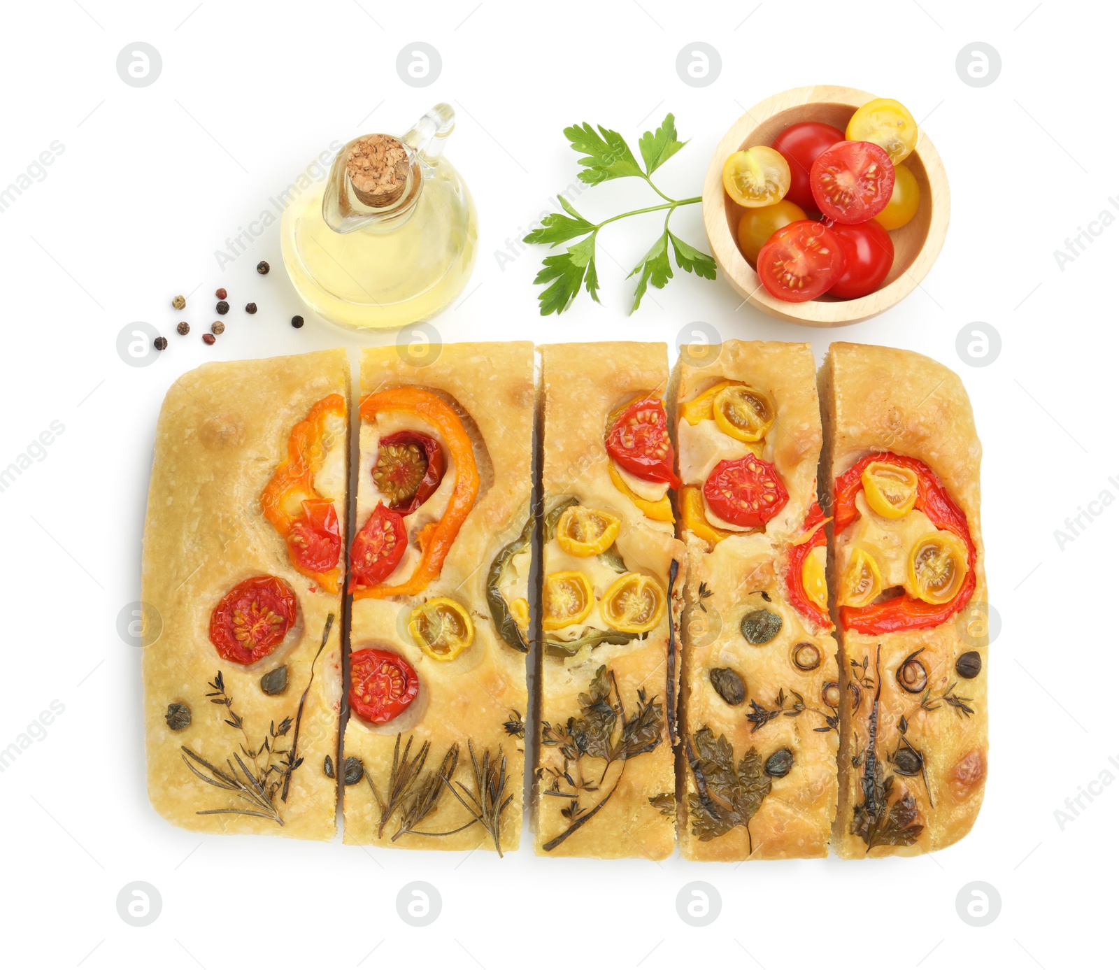 Cut delicious focaccia with flowers made of vegetables and ingredients isolated on white, top view Photo of Cut delicious focaccia with flowers made of vegetables and ingredients isolated on white, top view
