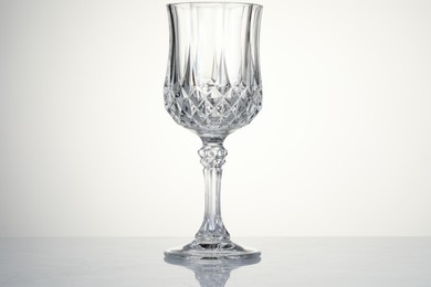 One empty clean glass isolated on white