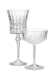 Photo of Different empty clean glasses isolated on white