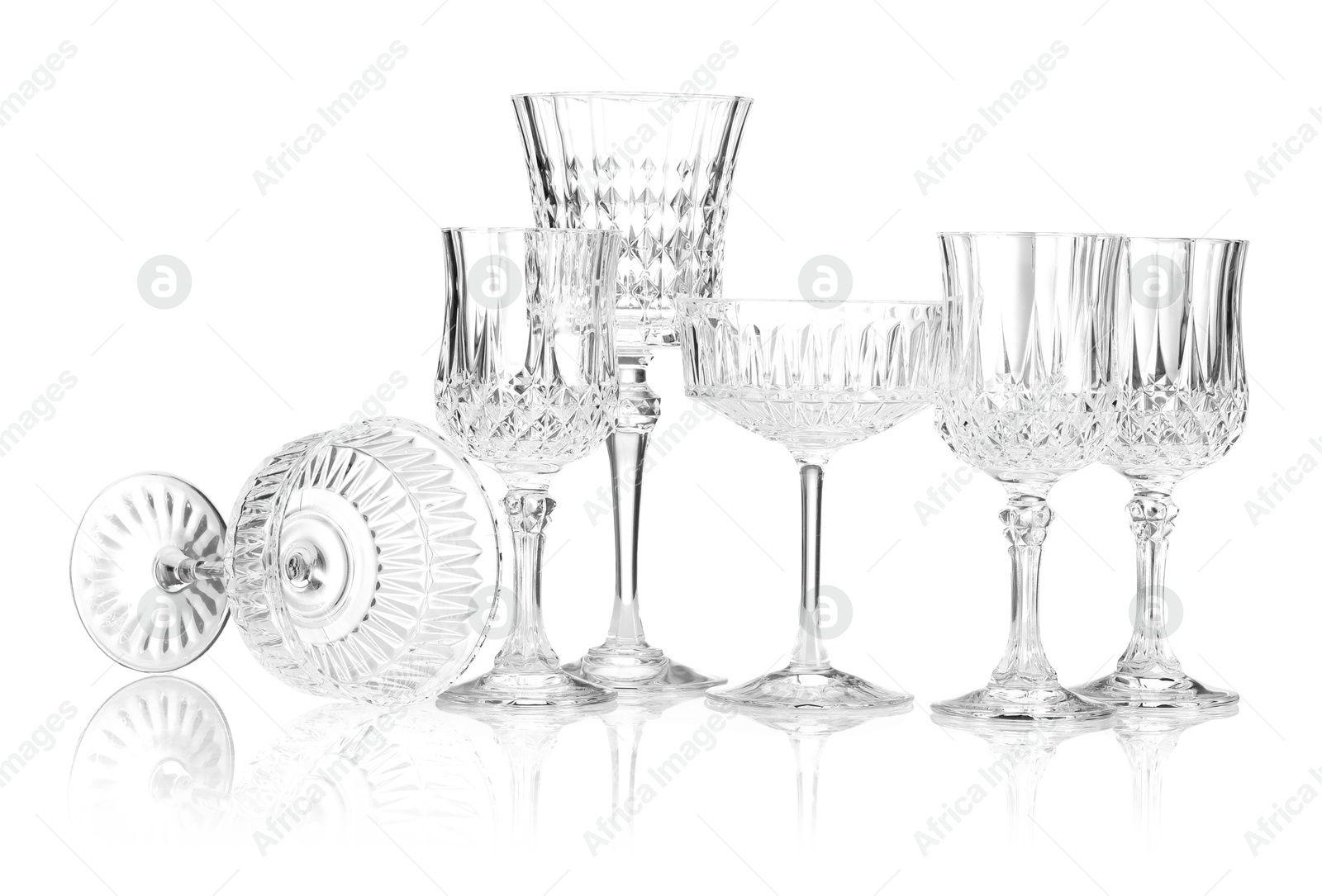 Different empty clean glasses isolated on white Photo of Different empty clean glasses isolated on white