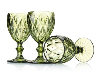 Photo of Three empty clean glasses isolated on white