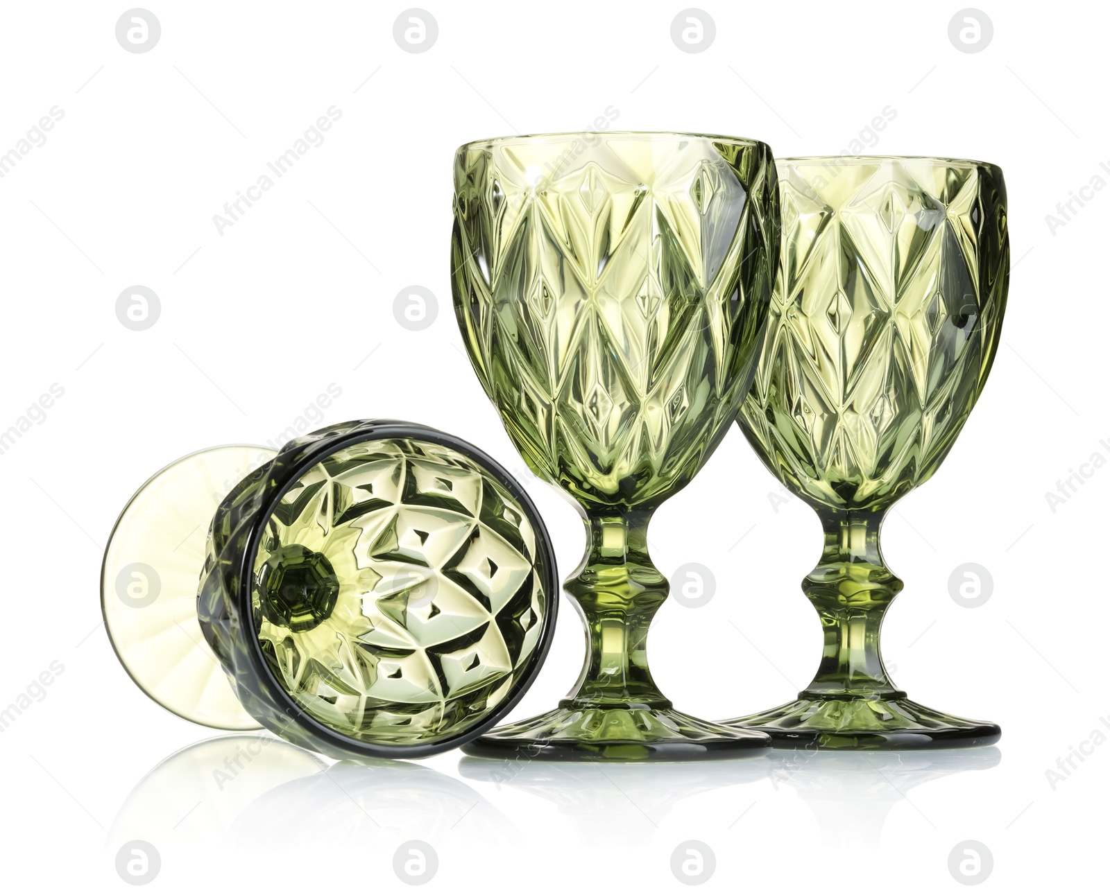 Three empty clean glasses isolated on white Photo of Three empty clean glasses isolated on white