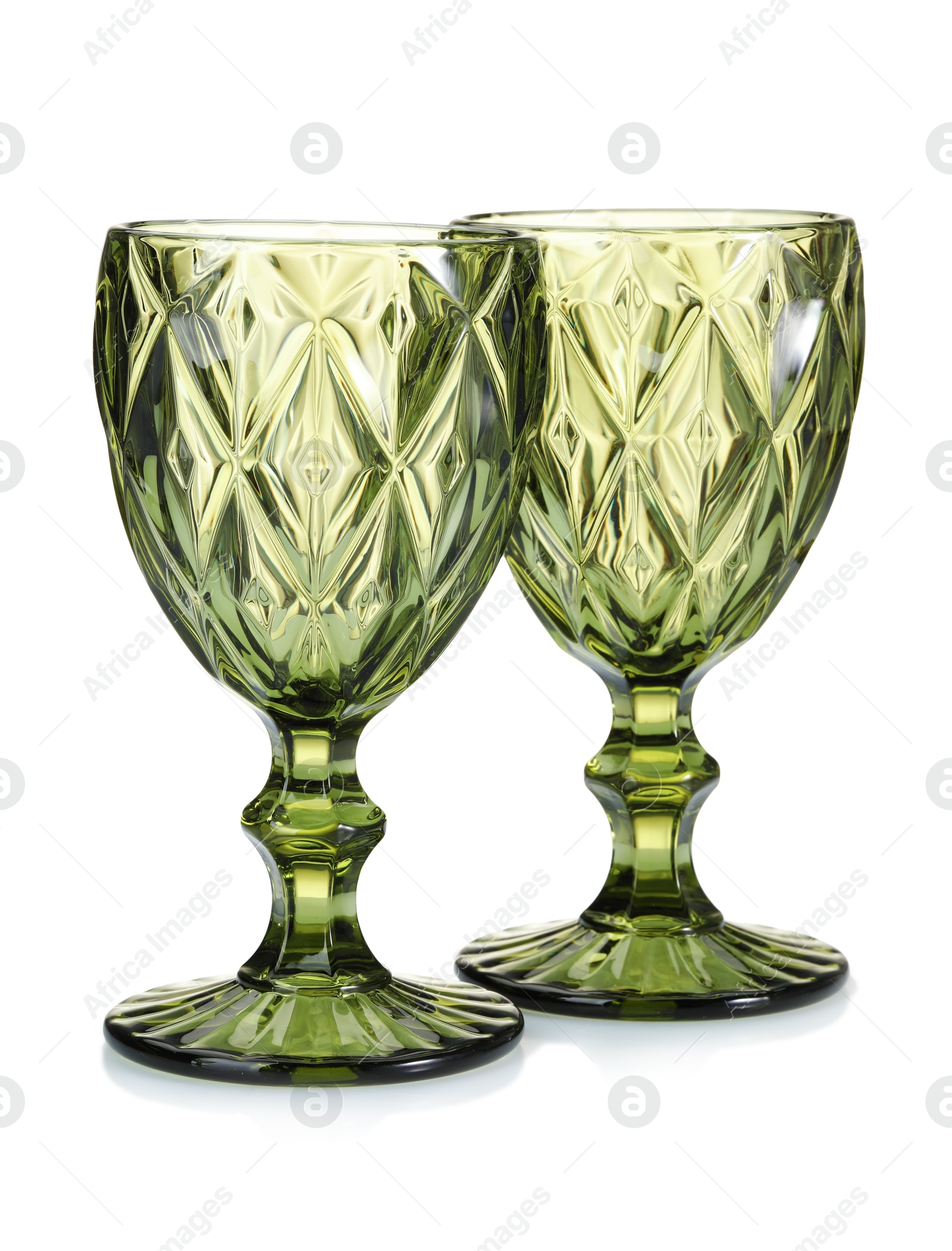 Photo of Two empty clean glasses isolated on white