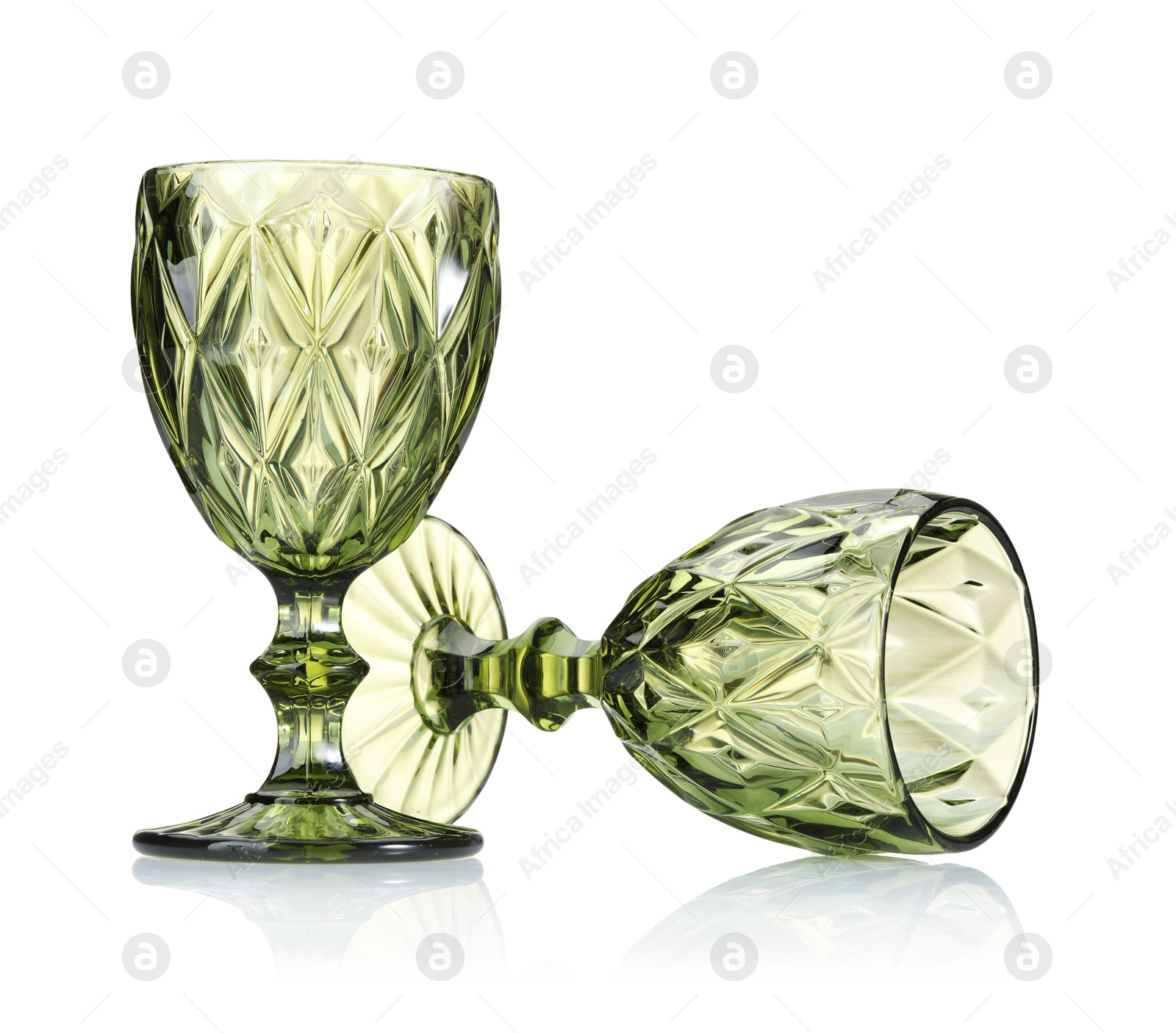 Two empty clean glasses isolated on white Photo of Two empty clean glasses isolated on white