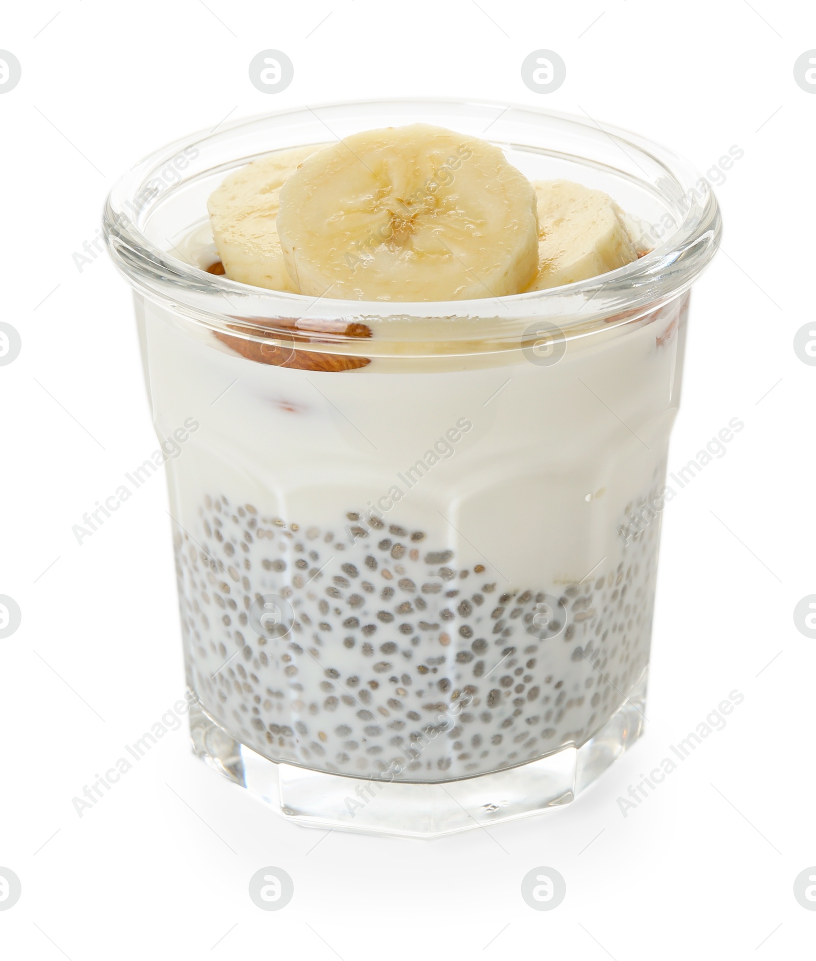 Delicious dessert with chia seeds, yogurt, banana and almond in glass on white background. Superfood Photo of Delicious dessert with chia seeds, yogurt, banana and almond in glass on white background. Superfood