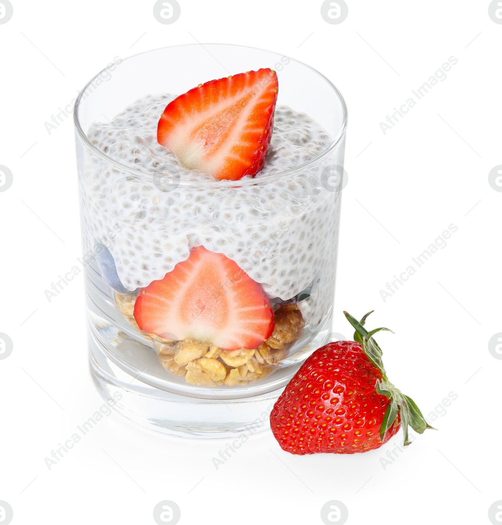 Delicious dessert with chia seeds, yogurt, granola, strawberries and berries in glass isolated on white. Superfood Photo of Delicious dessert with chia seeds, yogurt, granola, strawberries and berries in glass isolated on white. Superfood