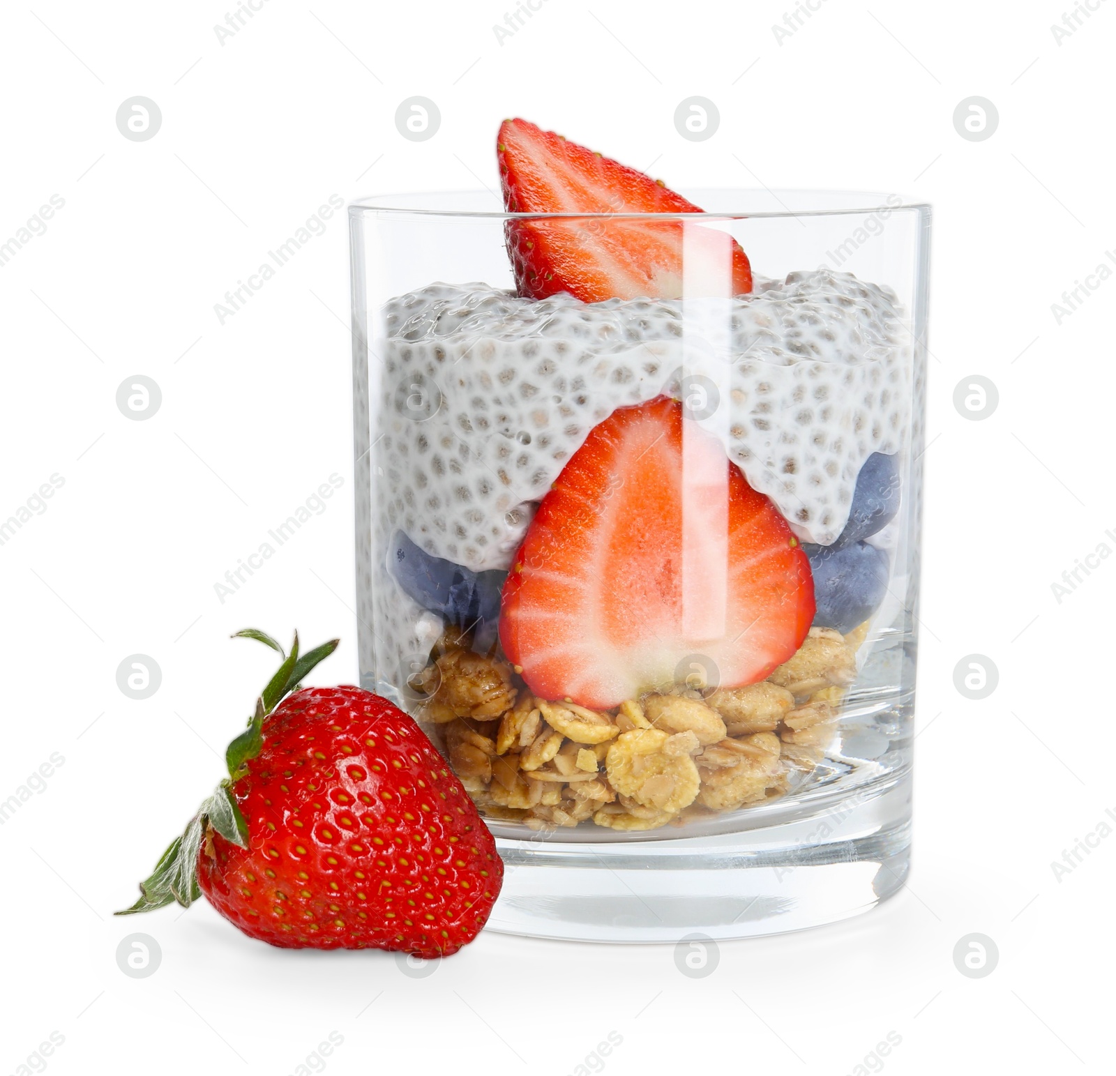 Delicious dessert with chia seeds, yogurt, granola, strawberries and berries in glass isolated on white. Superfood Photo of Delicious dessert with chia seeds, yogurt, granola, strawberries and berries in glass isolated on white. Superfood