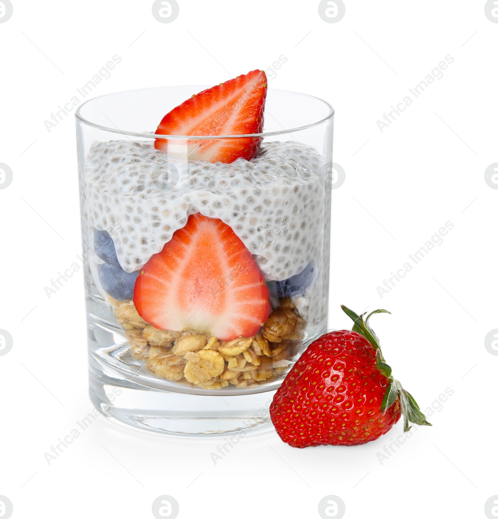 Delicious dessert with chia seeds, yogurt, granola, strawberries and berries in glass isolated on white. Superfood Photo of Delicious dessert with chia seeds, yogurt, granola, strawberries and berries in glass isolated on white. Superfood