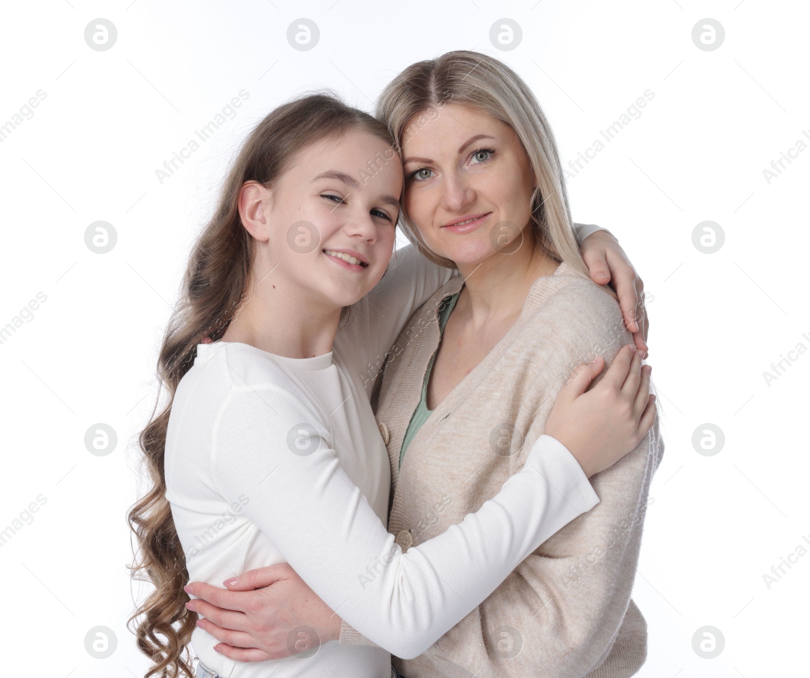 Portrait of mother with her daughter on white background Photo of Portrait of mother with her daughter on white background