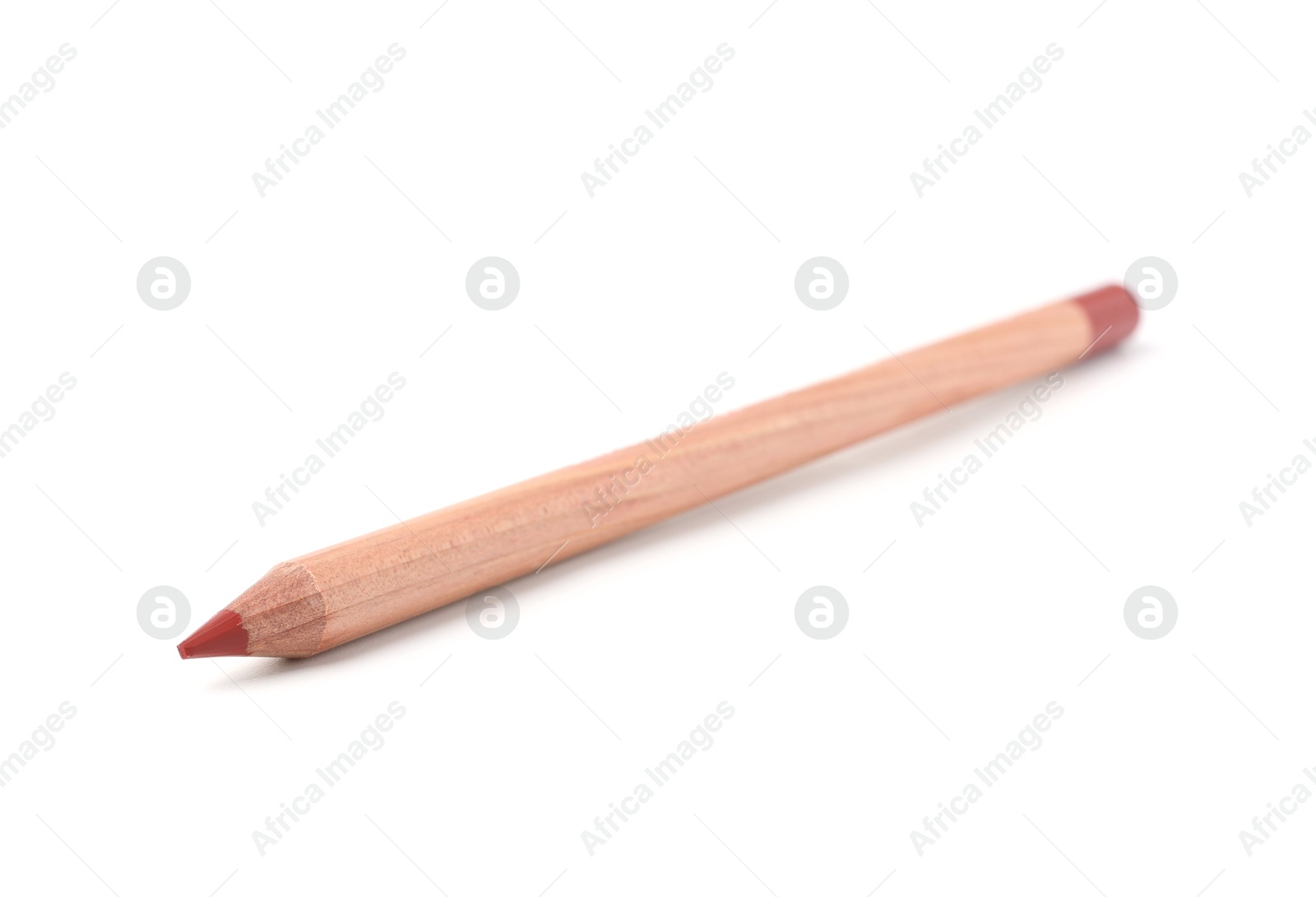 One lip pencil isolated on white. Cosmetic product Photo of One lip pencil isolated on white. Cosmetic product