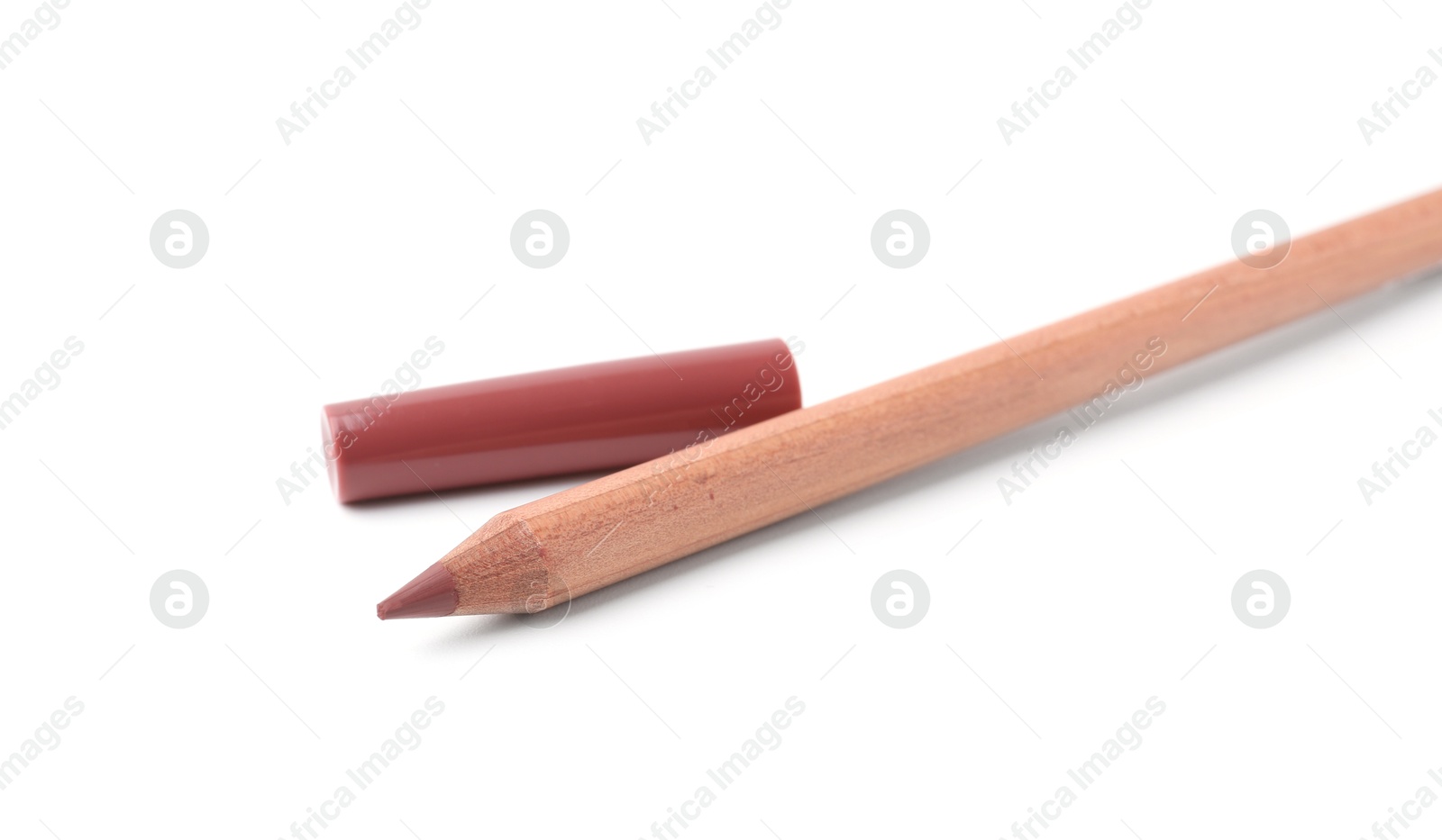 One lip pencil isolated on white. Cosmetic product Photo of One lip pencil isolated on white. Cosmetic product