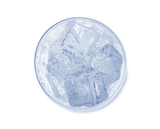 Image of Top view of soda water with ice in glass on white background