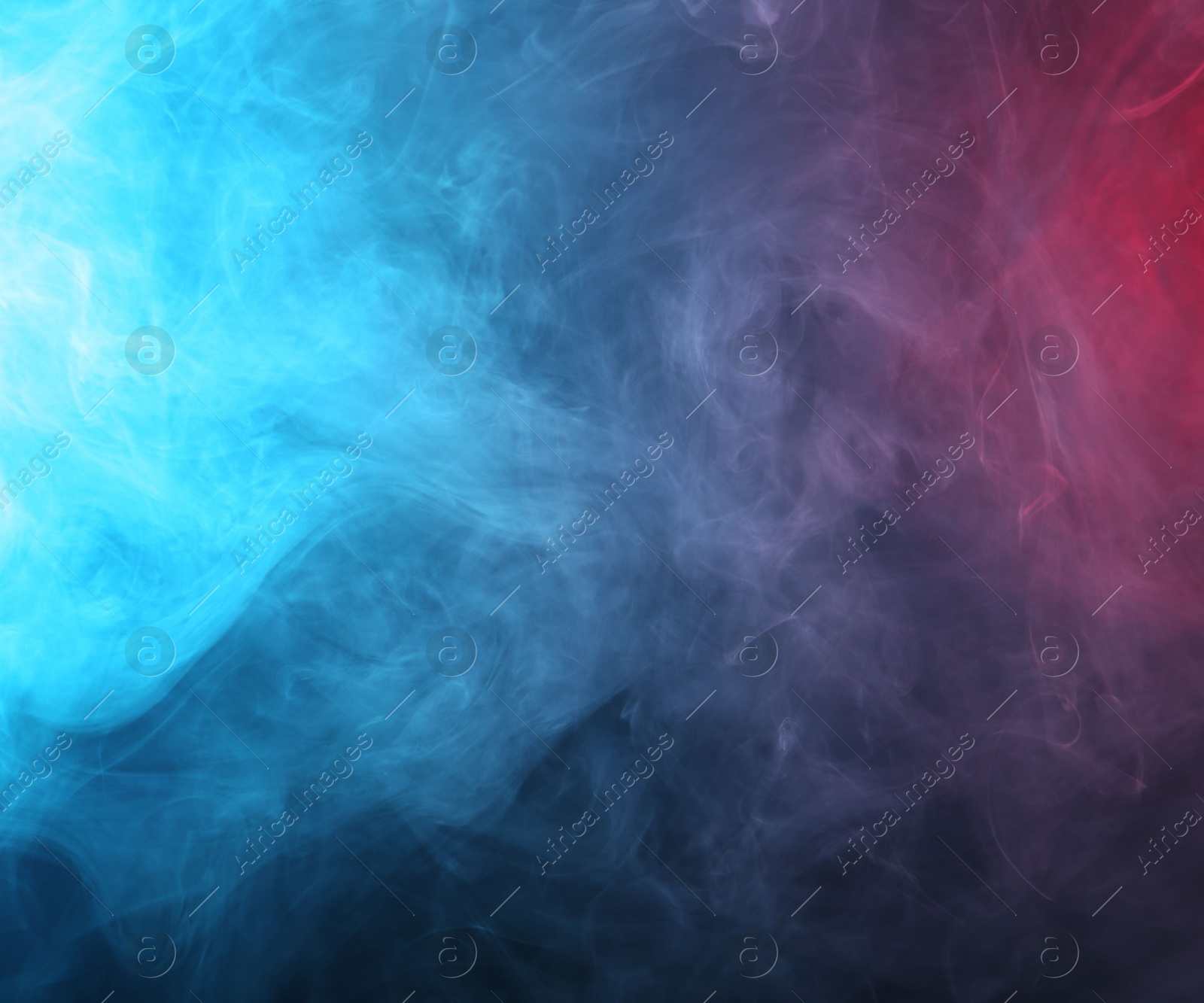 Beautiful smoke in neon lights on dark background Photo of Beautiful smoke in neon lights on dark background