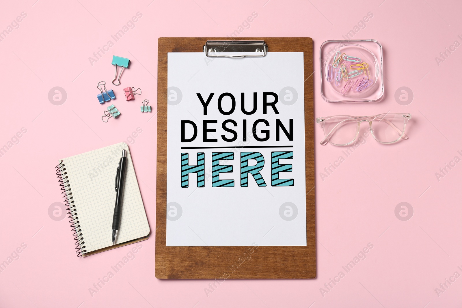 Clipboard with sheet of paper, eyeglasses and stationery on pink background, top view. Mockup Your Design Here Image of Clipboard with sheet of paper, eyeglasses and stationery on pink background, top view. Mockup Your Design Here