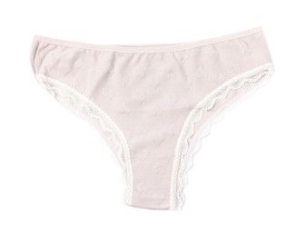 Photo of Women's underwear. Beautiful beige panties isolated on white, top view