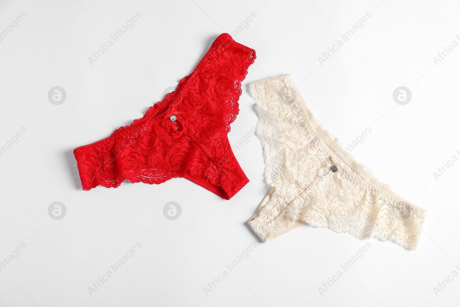 Women's underwear. Beautiful panties on white background, flat lay Photo of Women's underwear. Beautiful panties on white background, flat lay
