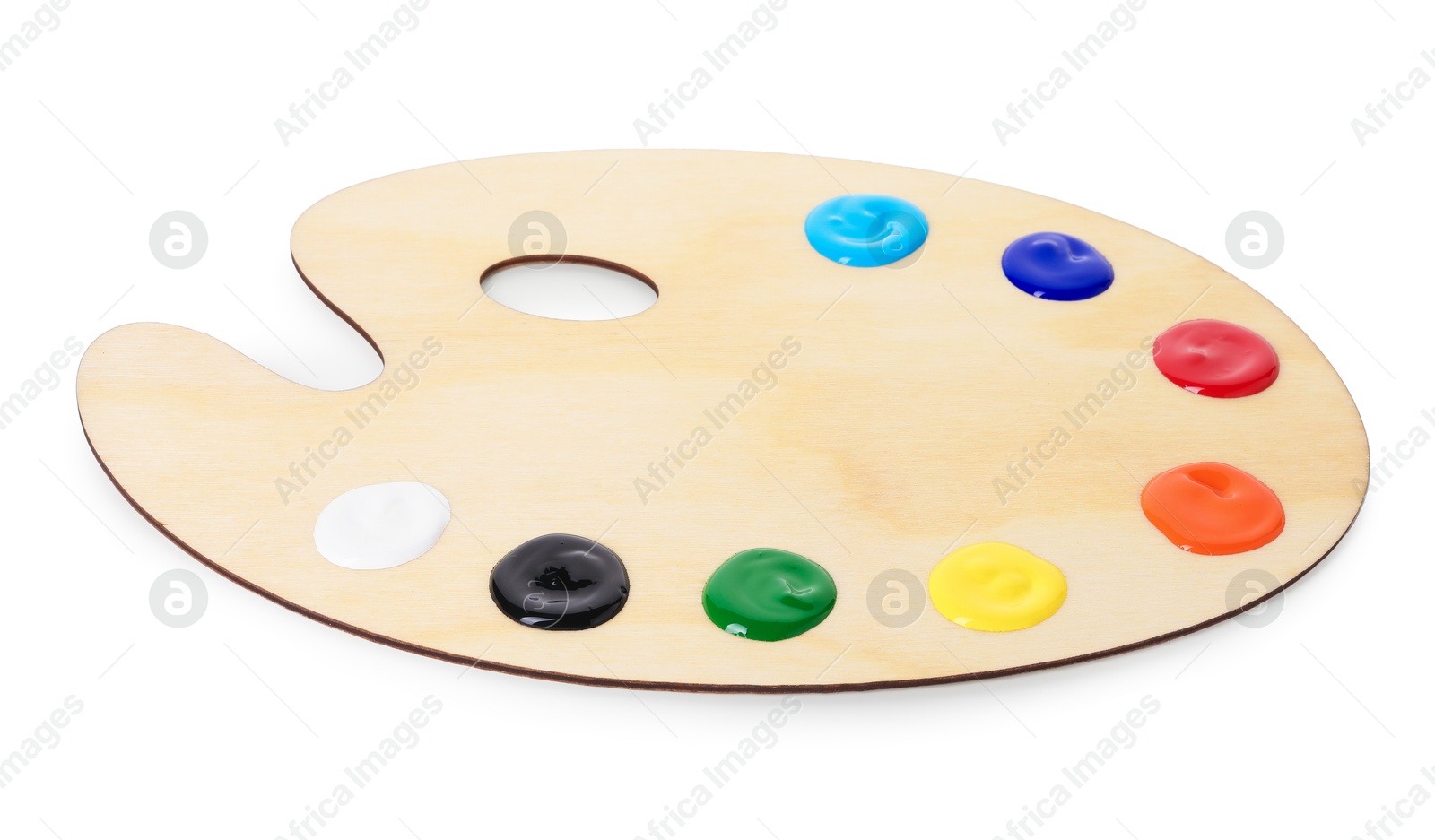 Photo of Wooden palette with paints isolated on white