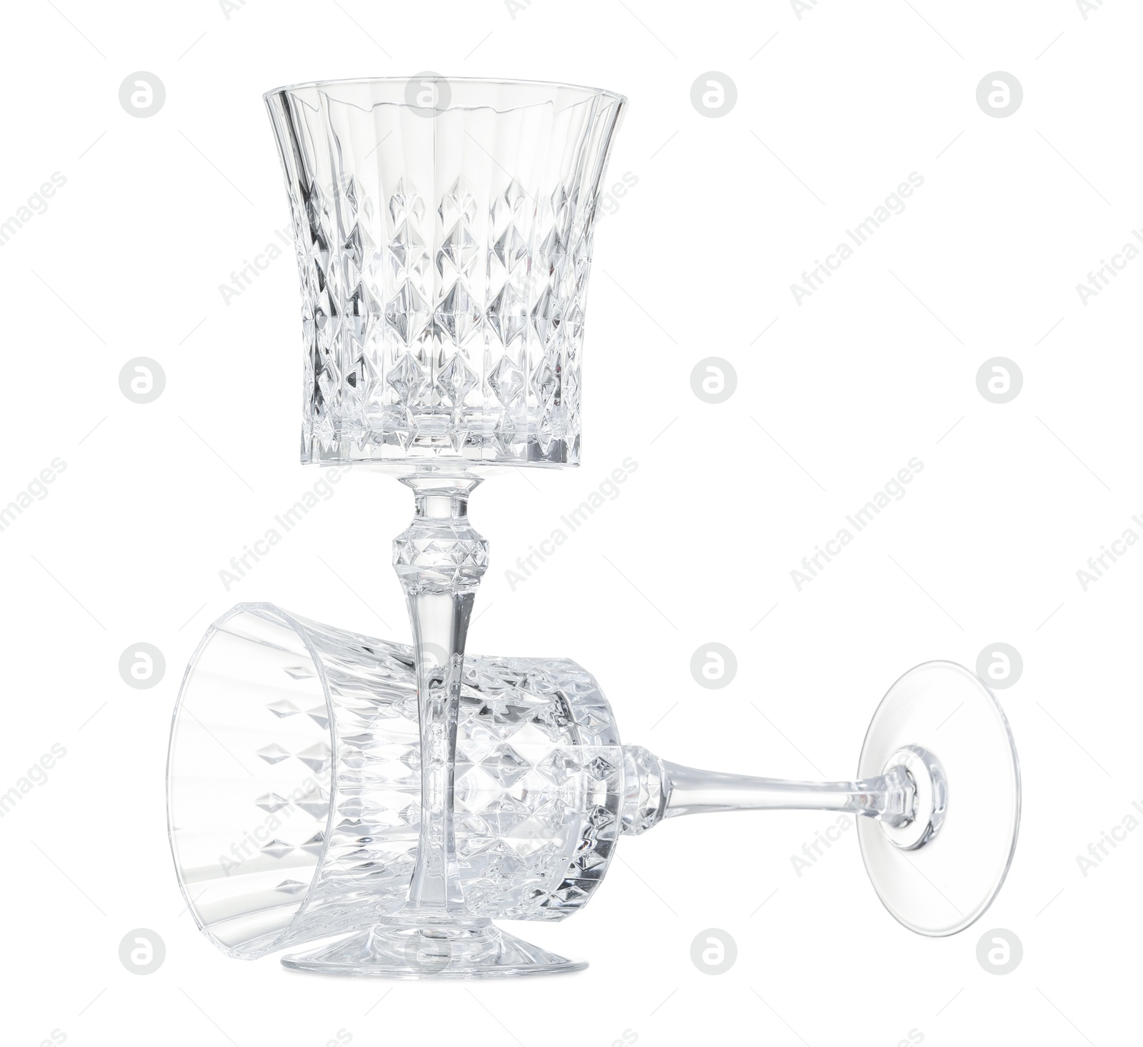 Two empty clean glasses isolated on white Photo of Two empty clean glasses isolated on white