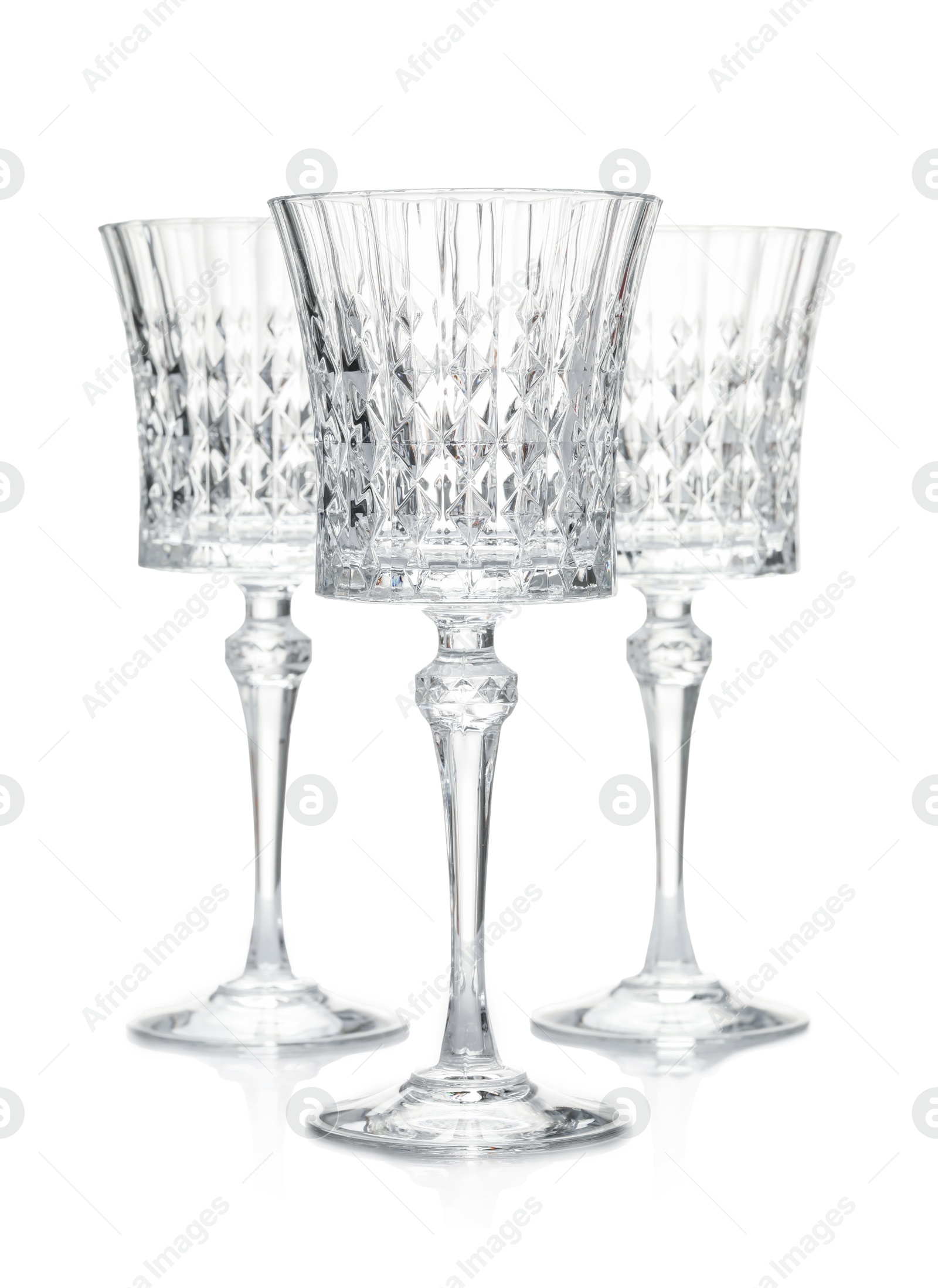 Three empty clean glasses isolated on white Photo of Three empty clean glasses isolated on white