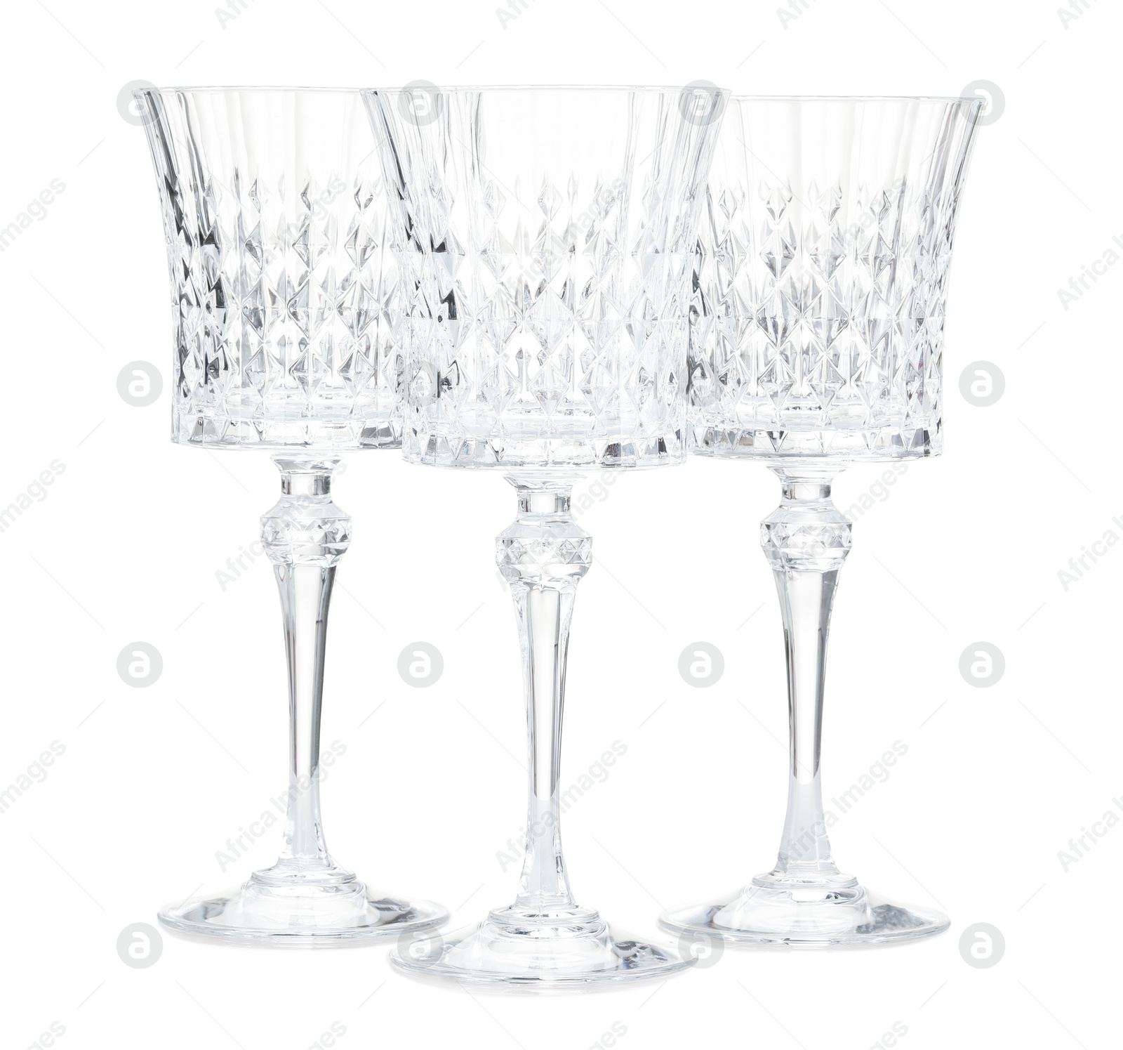 Three empty clean glasses isolated on white Photo of Three empty clean glasses isolated on white