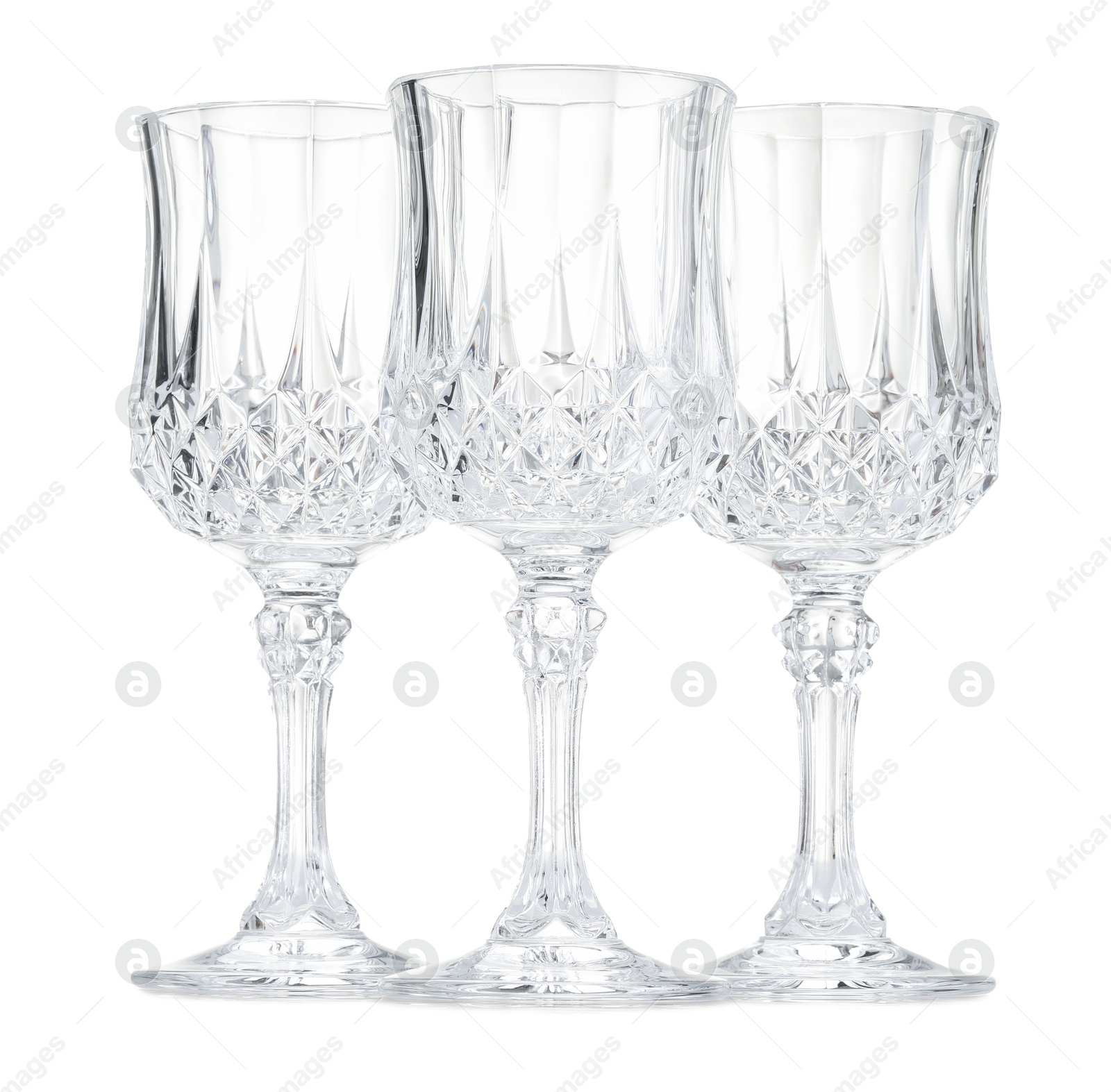 Three empty clean glasses isolated on white Photo of Three empty clean glasses isolated on white