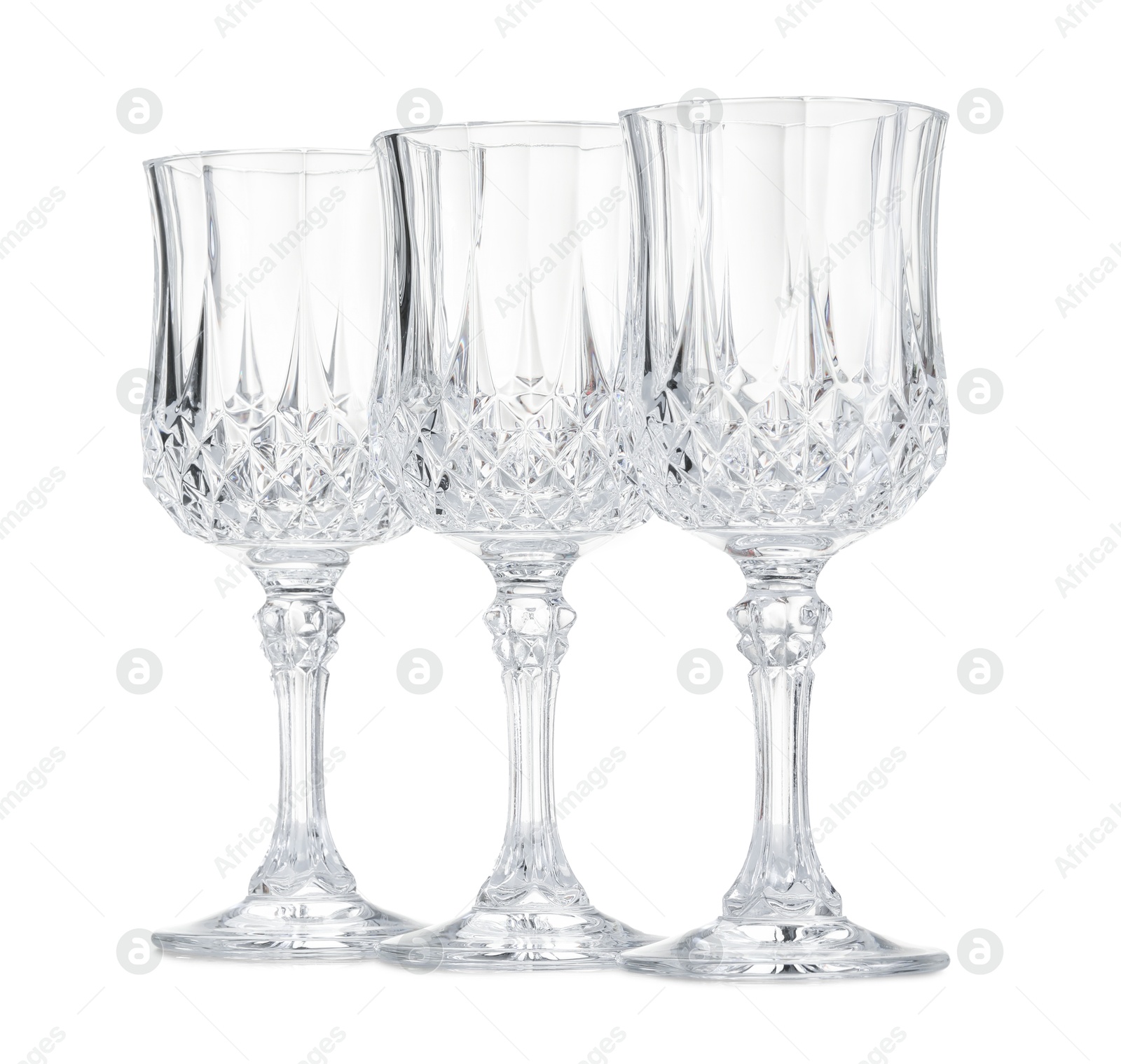 Three empty clean glasses isolated on white Photo of Three empty clean glasses isolated on white