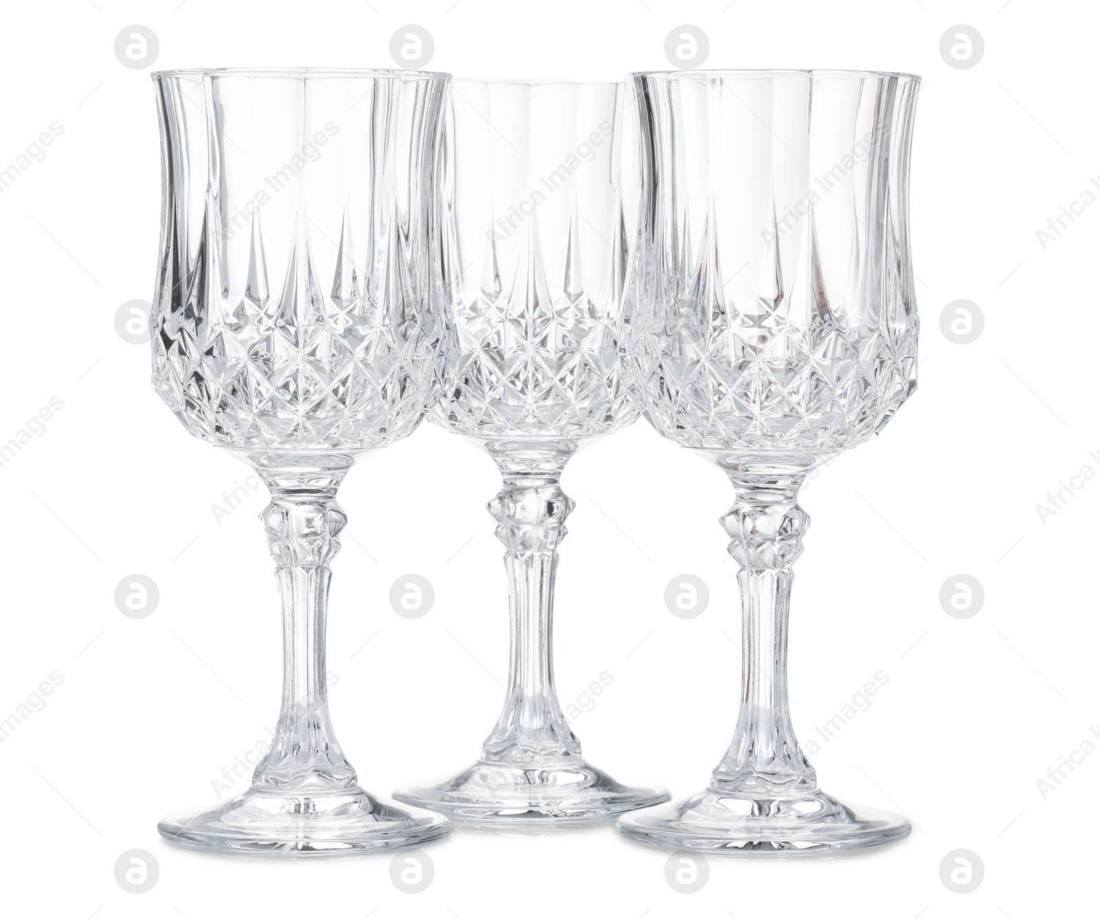 Three empty clean glasses isolated on white Photo of Three empty clean glasses isolated on white