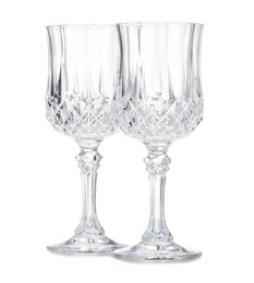 Photo of Two empty clean glasses isolated on white