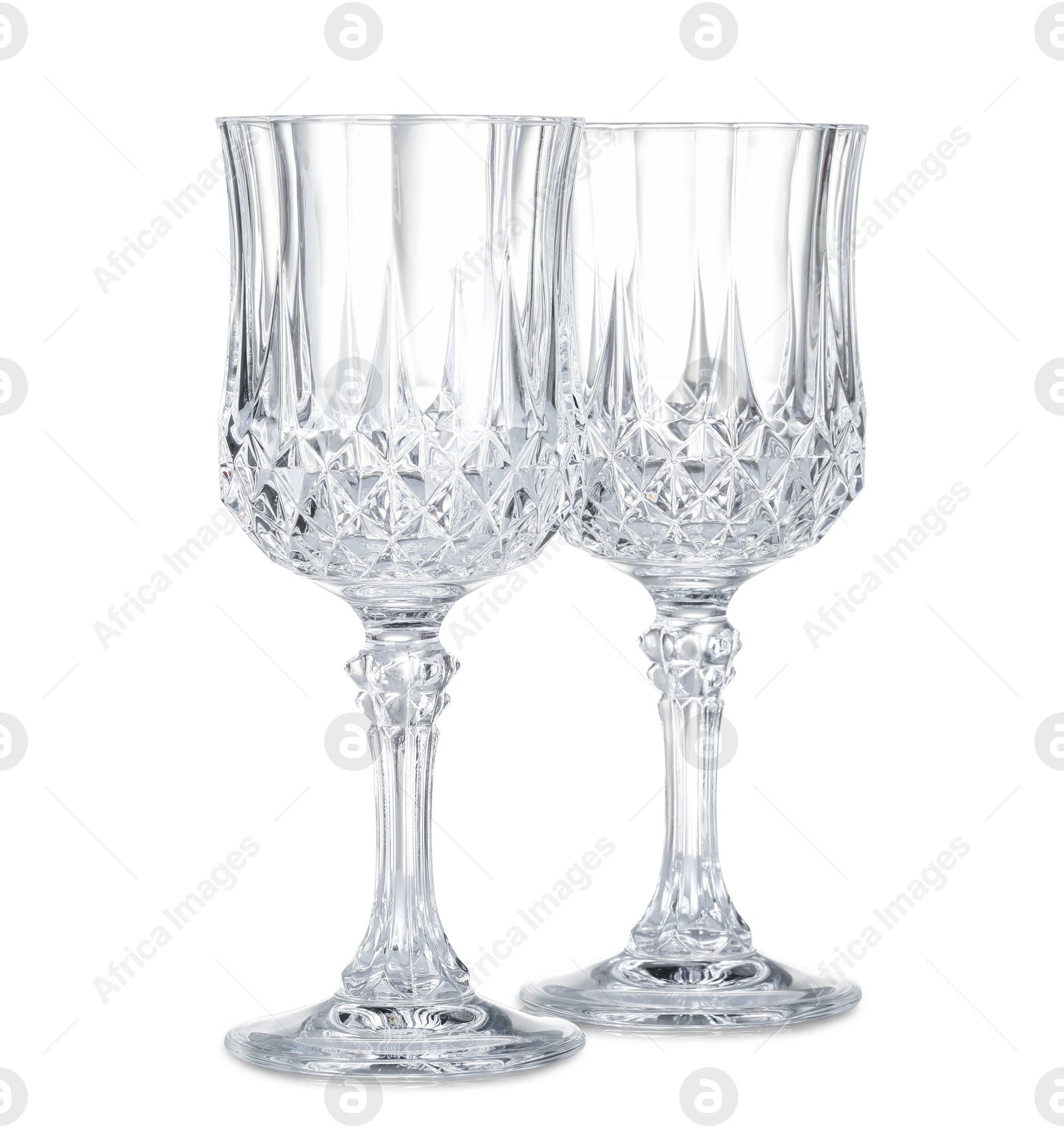 Photo of Two empty clean glasses isolated on white