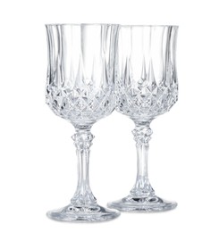 Photo of Two empty clean glasses isolated on white
