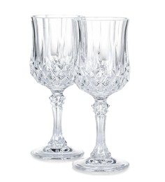 Photo of Two empty clean glasses isolated on white