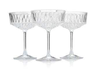 Photo of Three empty clean glasses isolated on white