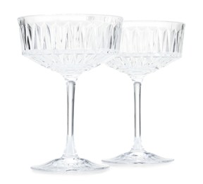 Photo of Two empty clean glasses isolated on white