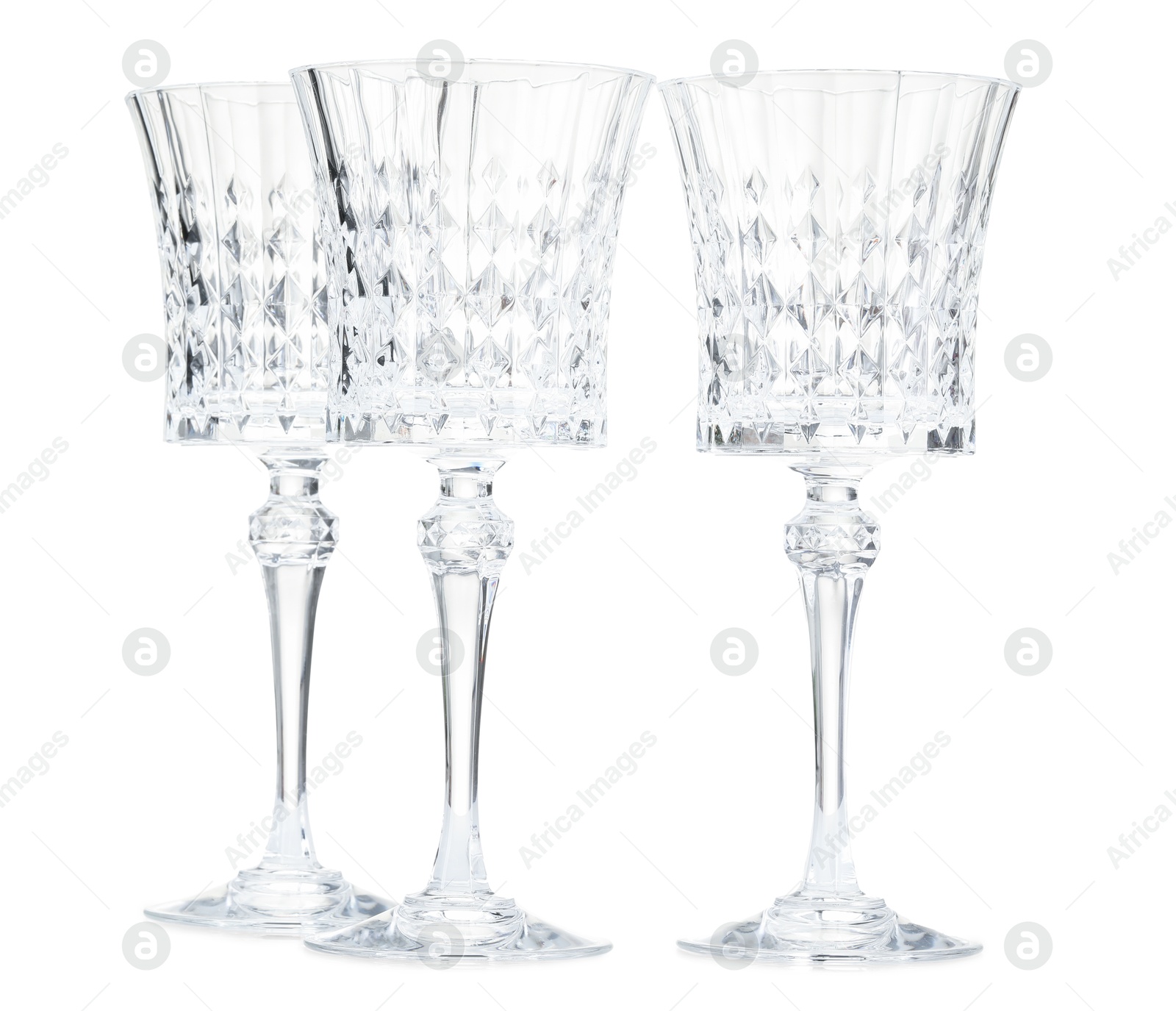 Three empty clean glasses isolated on white Photo of Three empty clean glasses isolated on white