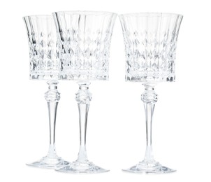 Photo of Three empty clean glasses isolated on white