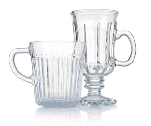 Photo of Different empty clean glasses isolated on white