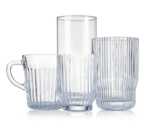 Photo of Different empty clean glasses isolated on white