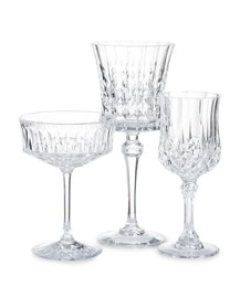 Photo of Different empty clean glasses isolated on white