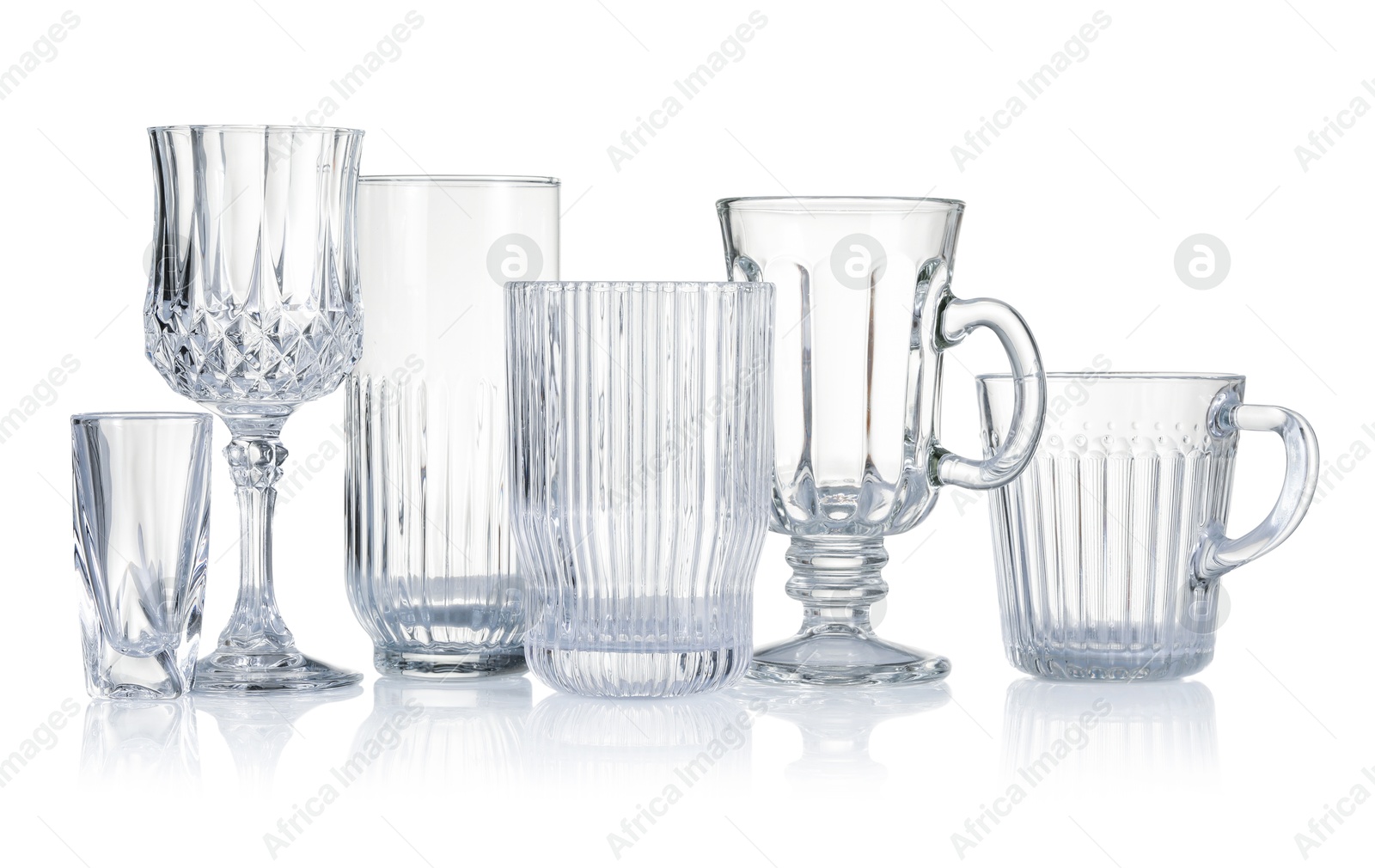 Different empty clean glasses isolated on white Photo of Different empty clean glasses isolated on white