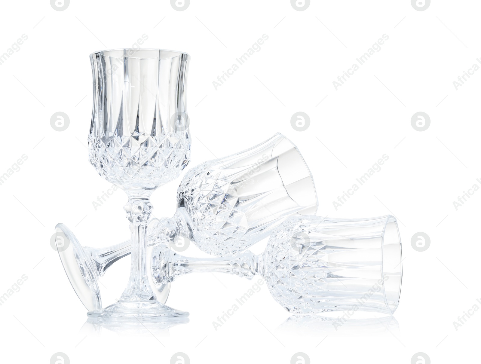 Three empty clean glasses isolated on white Photo of Three empty clean glasses isolated on white