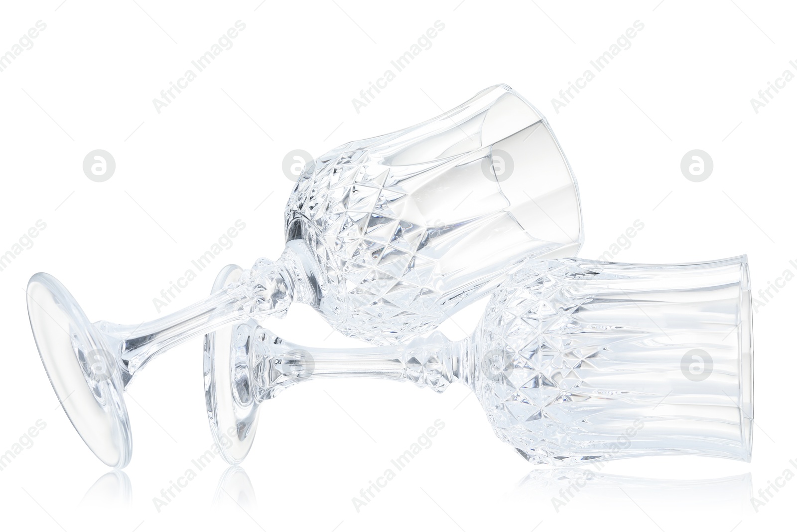 Two empty clean glasses isolated on white Photo of Two empty clean glasses isolated on white
