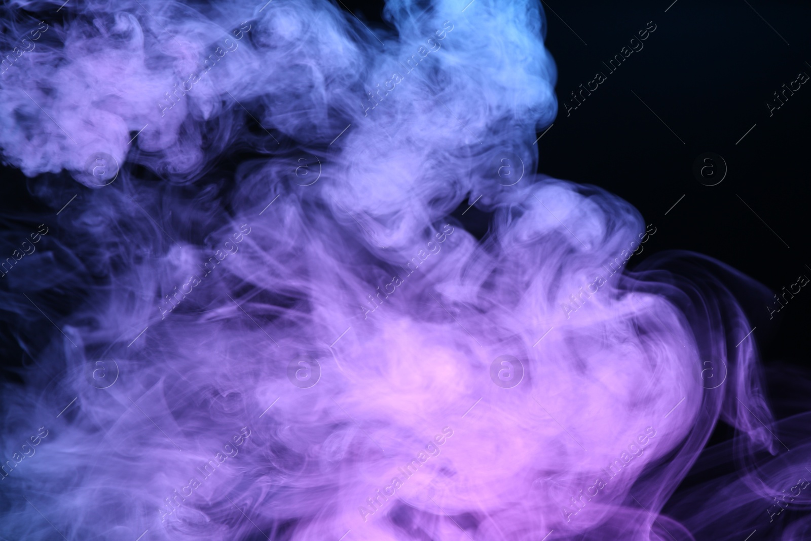 Beautiful smoke in neon lights on dark background Photo of Beautiful smoke in neon lights on dark background