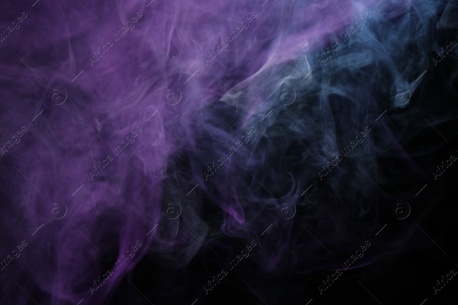 Beautiful smoke in neon lights on dark background Photo of Beautiful smoke in neon lights on dark background