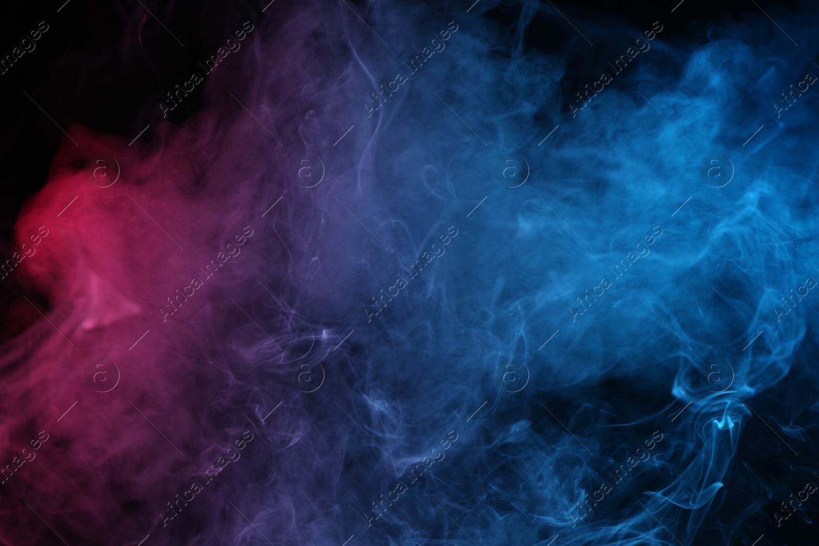 Beautiful smoke in neon lights on dark background Photo of Beautiful smoke in neon lights on dark background