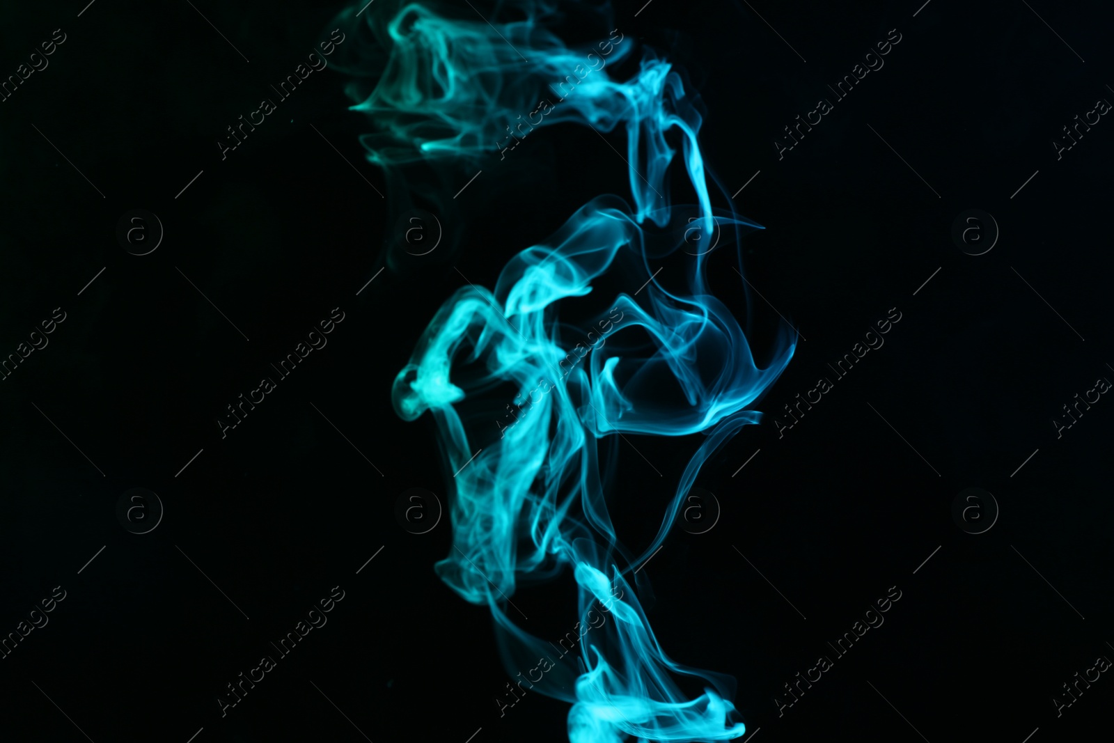 Beautiful smoke in neon lights on dark background Photo of Beautiful smoke in neon lights on dark background